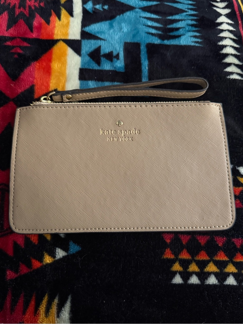 kate spade blush taupe wristlet clutch with gold logo
